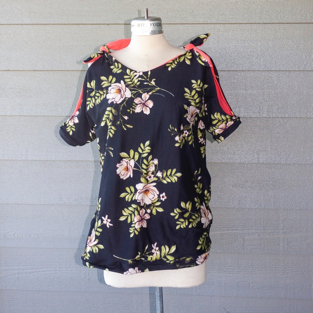 Reversible floral/coral cold shoulder tie blouse